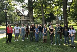 Prof. Carso and college class on a field trip outside an historic site